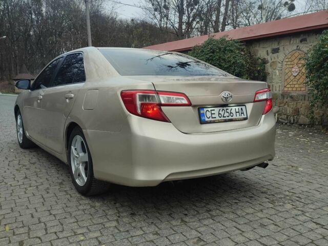 Бежевый Тойота Камри, объемом двигателя 2.5 л и пробегом 250 тыс. км за 11800 $, фото 5 на Automoto.ua