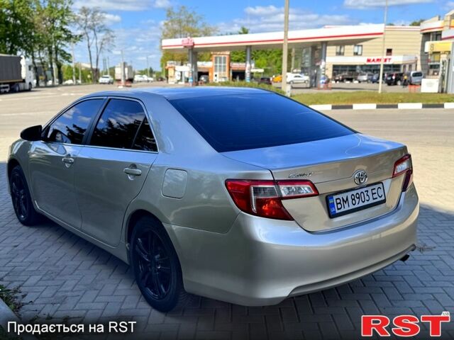 Бежевый Тойота Камри, объемом двигателя 2.5 л и пробегом 243 тыс. км за 12800 $, фото 4 на Automoto.ua