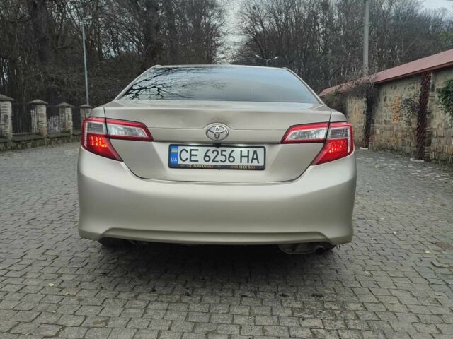 Бежевый Тойота Камри, объемом двигателя 2.5 л и пробегом 250 тыс. км за 11800 $, фото 4 на Automoto.ua
