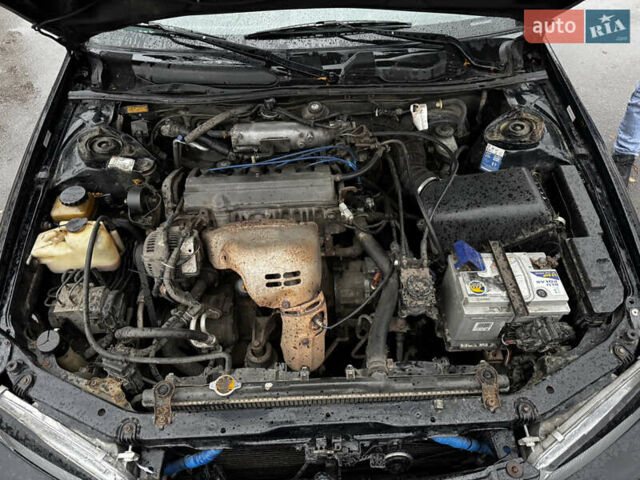 Чорний Тойота Камрі, об'ємом двигуна 2.2 л та пробігом 360 тис. км за 3450 $, фото 12 на Automoto.ua