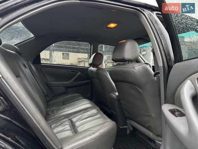 Чорний Тойота Камрі, об'ємом двигуна 2.2 л та пробігом 360 тис. км за 3450 $, фото 9 на Automoto.ua