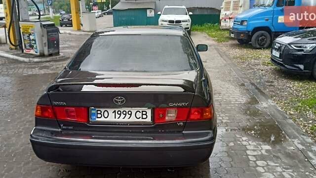 Чорний Тойота Камрі, об'ємом двигуна 3 л та пробігом 333 тис. км за 2850 $, фото 5 на Automoto.ua