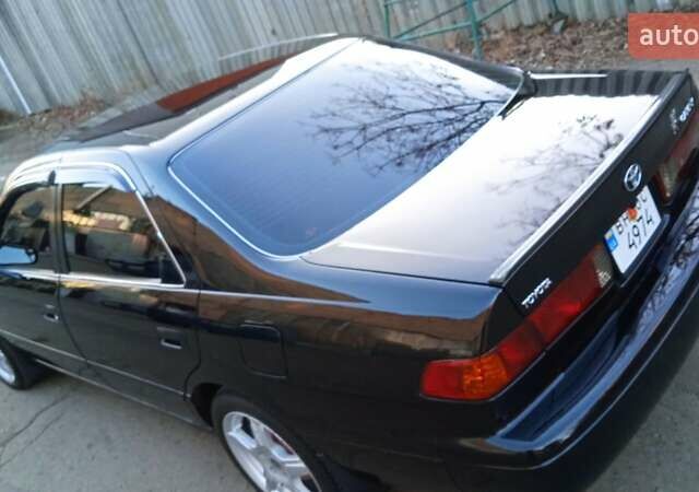 Черный Тойота Камри, объемом двигателя 2.2 л и пробегом 343 тыс. км за 5100 $, фото 1 на Automoto.ua