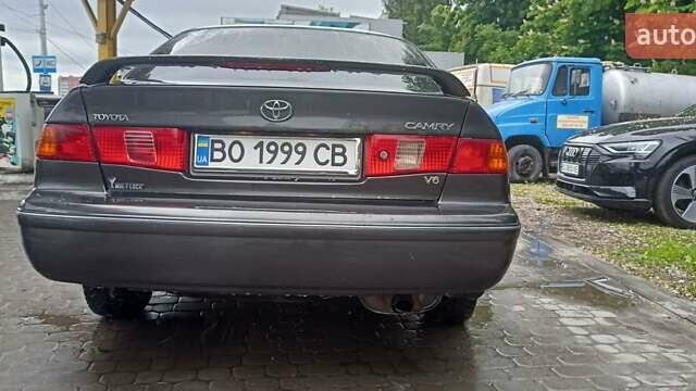 Чорний Тойота Камрі, об'ємом двигуна 3 л та пробігом 333 тис. км за 2850 $, фото 25 на Automoto.ua