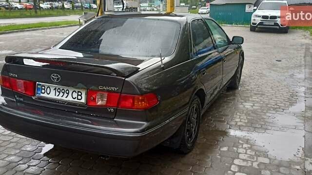 Чорний Тойота Камрі, об'ємом двигуна 3 л та пробігом 333 тис. км за 2850 $, фото 6 на Automoto.ua
