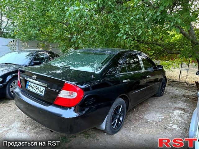 Чорний Тойота Камрі, об'ємом двигуна 3 л та пробігом 290 тис. км за 4300 $, фото 8 на Automoto.ua