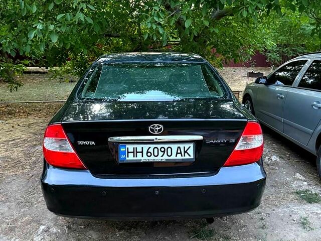 Чорний Тойота Камрі, об'ємом двигуна 3 л та пробігом 290 тис. км за 4300 $, фото 6 на Automoto.ua