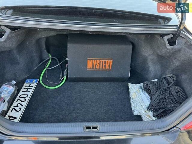 Черный Тойота Камри, объемом двигателя 2.4 л и пробегом 350 тыс. км за 6800 $, фото 4 на Automoto.ua