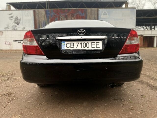 Чорний Тойота Камрі, об'ємом двигуна 2.4 л та пробігом 201 тис. км за 6999 $, фото 8 на Automoto.ua