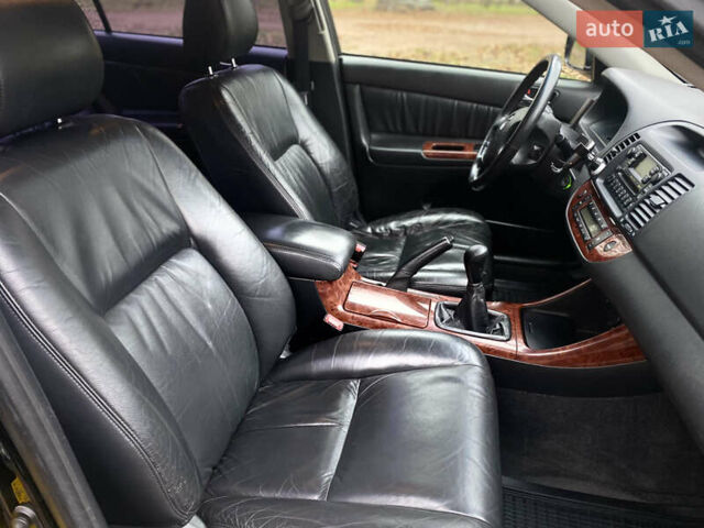 Чорний Тойота Камрі, об'ємом двигуна 2.4 л та пробігом 201 тис. км за 6999 $, фото 24 на Automoto.ua