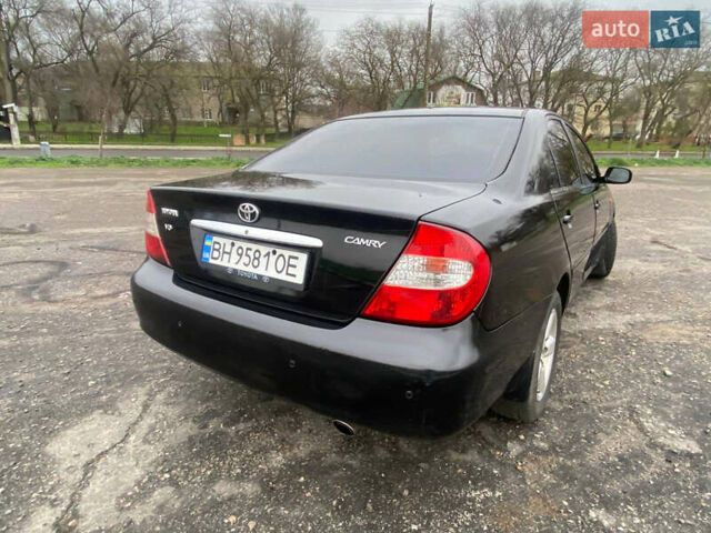 Черный Тойота Камри, объемом двигателя 3 л и пробегом 325 тыс. км за 6000 $, фото 6 на Automoto.ua