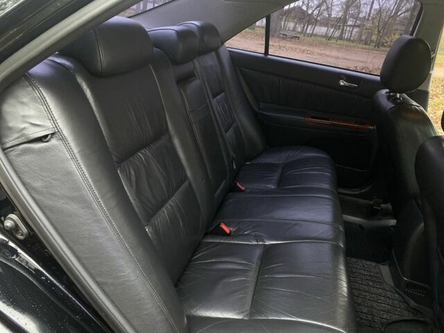 Чорний Тойота Камрі, об'ємом двигуна 2.4 л та пробігом 201 тис. км за 6999 $, фото 20 на Automoto.ua