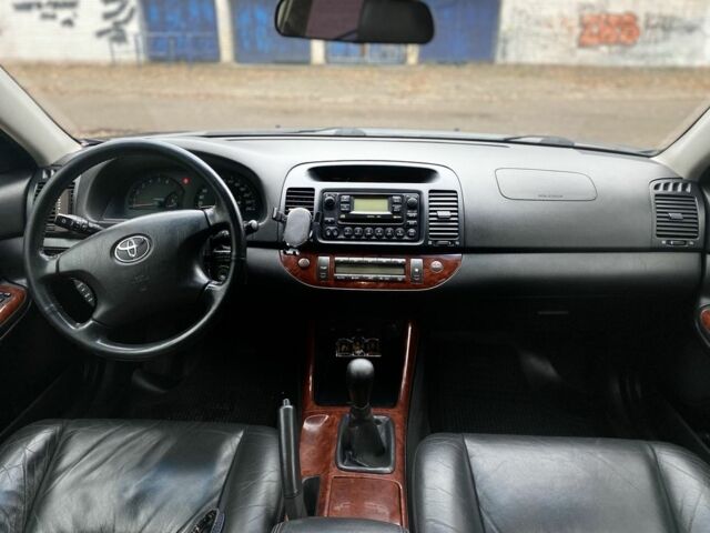 Чорний Тойота Камрі, об'ємом двигуна 2.4 л та пробігом 201 тис. км за 6999 $, фото 21 на Automoto.ua