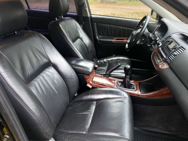 Чорний Тойота Камрі, об'ємом двигуна 2.4 л та пробігом 201 тис. км за 6999 $, фото 22 на Automoto.ua