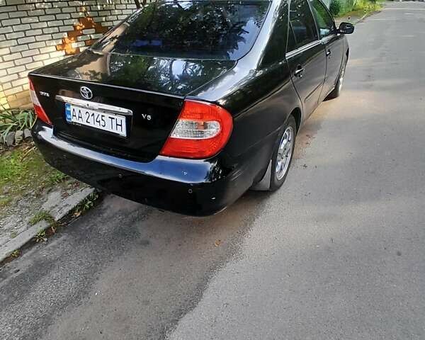 Чорний Тойота Камрі, об'ємом двигуна 3 л та пробігом 400 тис. км за 4000 $, фото 7 на Automoto.ua