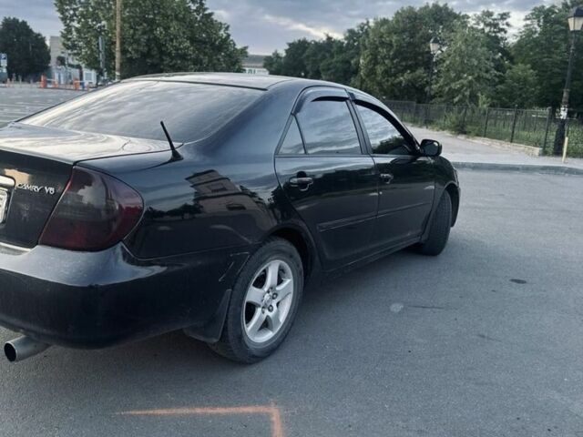 Чорний Тойота Камрі, об'ємом двигуна 3 л та пробігом 330 тис. км за 4400 $, фото 4 на Automoto.ua