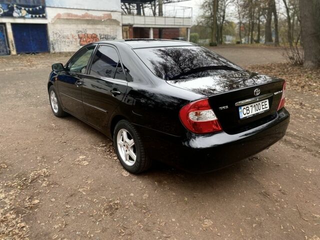 Чорний Тойота Камрі, об'ємом двигуна 2.4 л та пробігом 201 тис. км за 6999 $, фото 10 на Automoto.ua