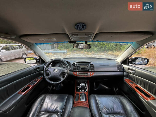 Черный Тойота Камри, объемом двигателя 3 л и пробегом 320 тыс. км за 5100 $, фото 4 на Automoto.ua