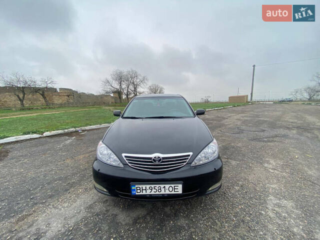 Черный Тойота Камри, объемом двигателя 3 л и пробегом 325 тыс. км за 6000 $, фото 5 на Automoto.ua