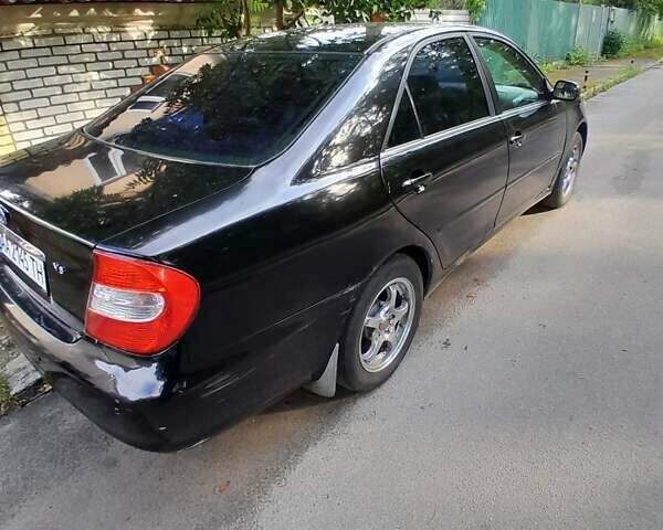 Чорний Тойота Камрі, об'ємом двигуна 3 л та пробігом 400 тис. км за 4000 $, фото 14 на Automoto.ua