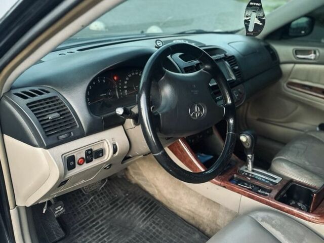 Чорний Тойота Камрі, об'ємом двигуна 3 л та пробігом 330 тис. км за 4400 $, фото 6 на Automoto.ua