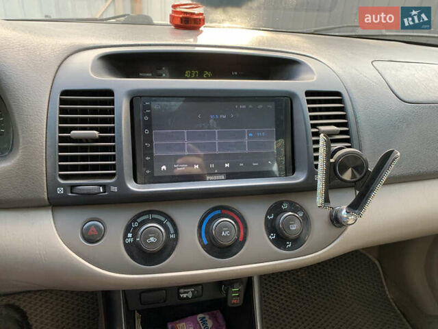 Черный Тойота Камри, объемом двигателя 2.37 л и пробегом 170 тыс. км за 4300 $, фото 15 на Automoto.ua