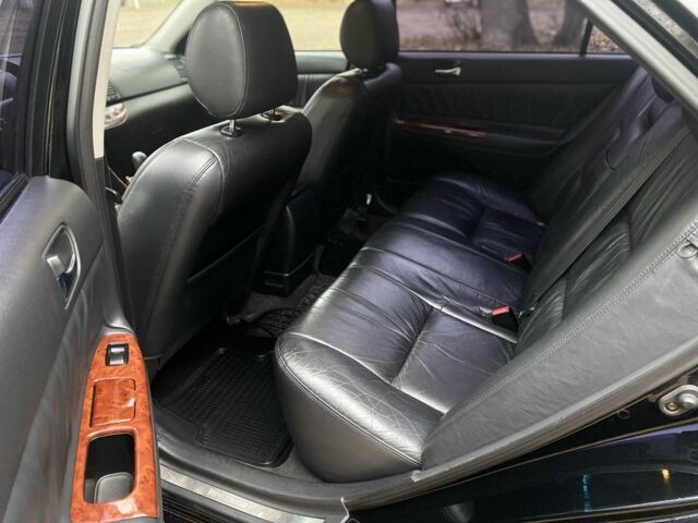 Чорний Тойота Камрі, об'ємом двигуна 2.4 л та пробігом 201 тис. км за 6999 $, фото 18 на Automoto.ua