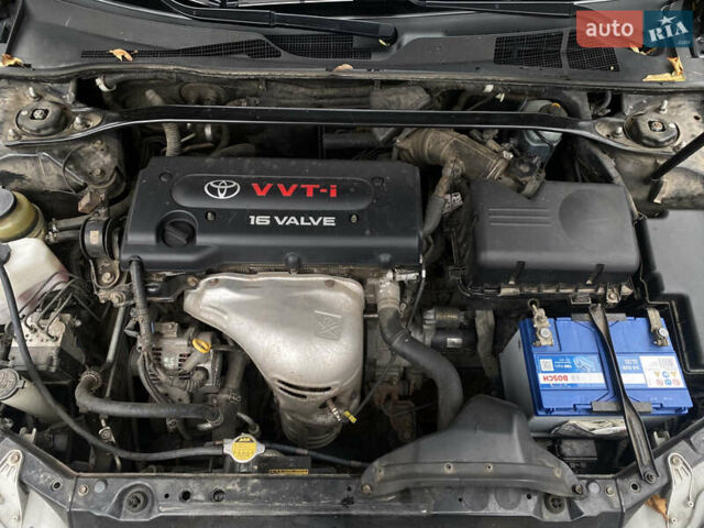 Чорний Тойота Камрі, об'ємом двигуна 2.4 л та пробігом 201 тис. км за 6999 $, фото 28 на Automoto.ua