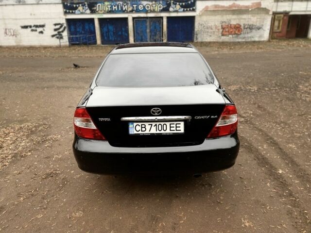 Чорний Тойота Камрі, об'ємом двигуна 2.4 л та пробігом 201 тис. км за 6999 $, фото 7 на Automoto.ua