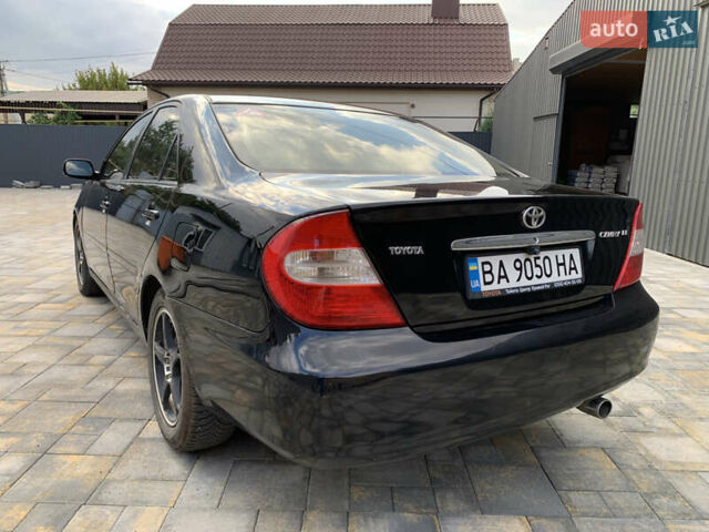 Черный Тойота Камри, объемом двигателя 2.37 л и пробегом 170 тыс. км за 4300 $, фото 5 на Automoto.ua