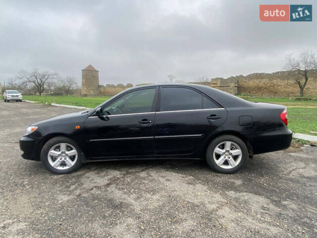 Черный Тойота Камри, объемом двигателя 3 л и пробегом 325 тыс. км за 6000 $, фото 3 на Automoto.ua