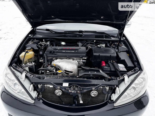 Черный Тойота Камри, объемом двигателя 2.36 л и пробегом 489 тыс. км за 5400 $, фото 13 на Automoto.ua