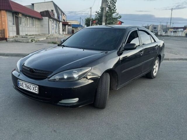 Чорний Тойота Камрі, об'ємом двигуна 3 л та пробігом 330 тис. км за 4400 $, фото 1 на Automoto.ua