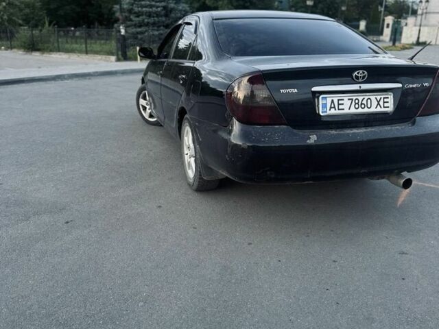 Чорний Тойота Камрі, об'ємом двигуна 3 л та пробігом 330 тис. км за 4400 $, фото 3 на Automoto.ua