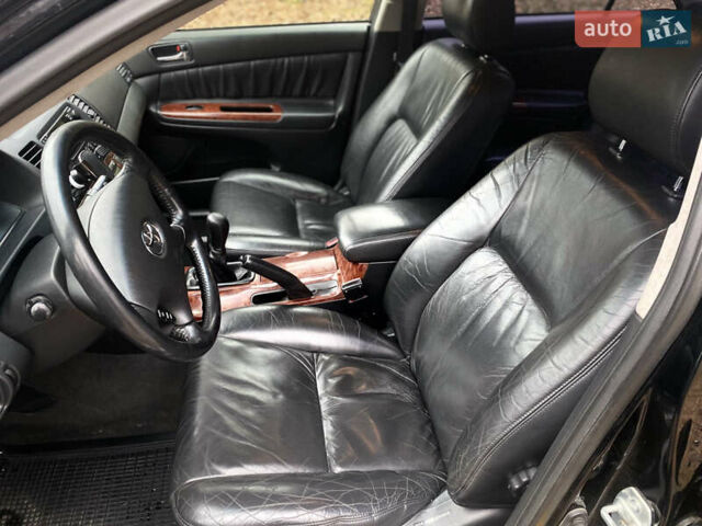 Чорний Тойота Камрі, об'ємом двигуна 2.4 л та пробігом 201 тис. км за 6999 $, фото 18 на Automoto.ua