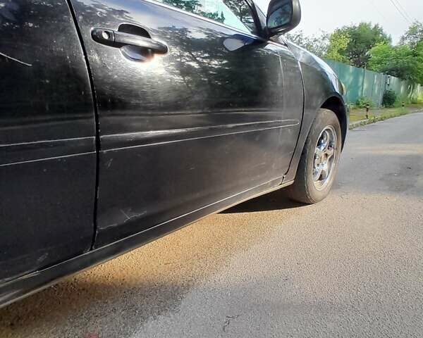 Чорний Тойота Камрі, об'ємом двигуна 3 л та пробігом 400 тис. км за 4000 $, фото 10 на Automoto.ua