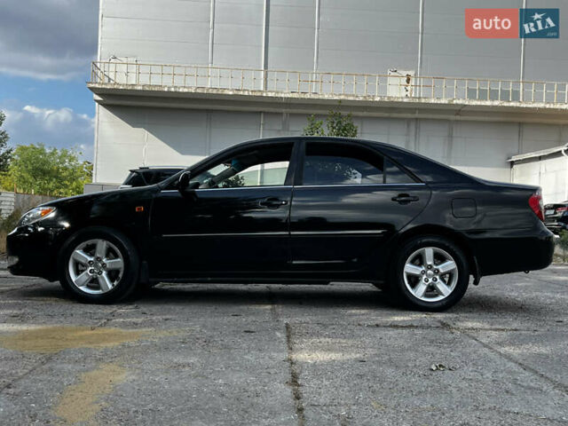 Черный Тойота Камри, объемом двигателя 3 л и пробегом 320 тыс. км за 5100 $, фото 3 на Automoto.ua