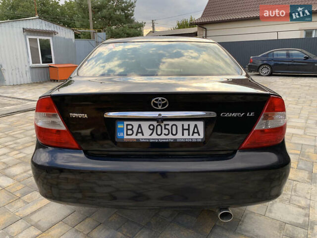 Черный Тойота Камри, объемом двигателя 2.37 л и пробегом 170 тыс. км за 4300 $, фото 8 на Automoto.ua