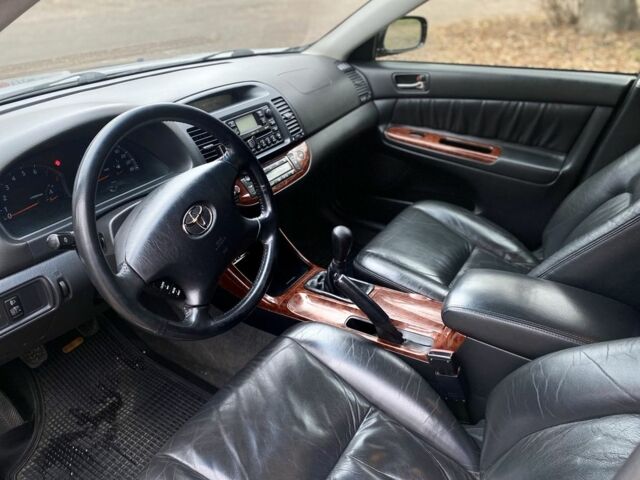 Чорний Тойота Камрі, об'ємом двигуна 2.4 л та пробігом 201 тис. км за 6999 $, фото 15 на Automoto.ua