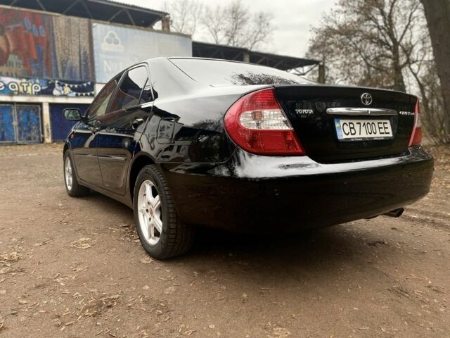 Чорний Тойота Камрі, об'ємом двигуна 2.4 л та пробігом 201 тис. км за 6999 $, фото 9 на Automoto.ua