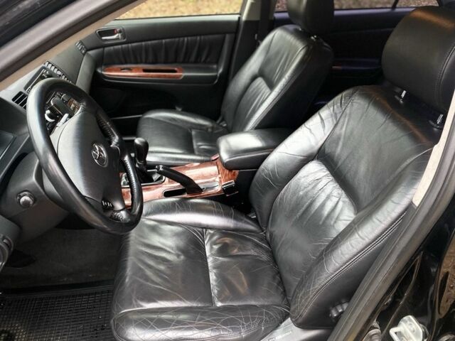 Чорний Тойота Камрі, об'ємом двигуна 2.4 л та пробігом 201 тис. км за 6999 $, фото 17 на Automoto.ua