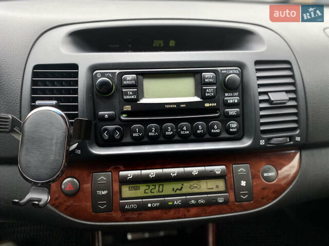 Чорний Тойота Камрі, об'ємом двигуна 2.4 л та пробігом 201 тис. км за 6999 $, фото 26 на Automoto.ua