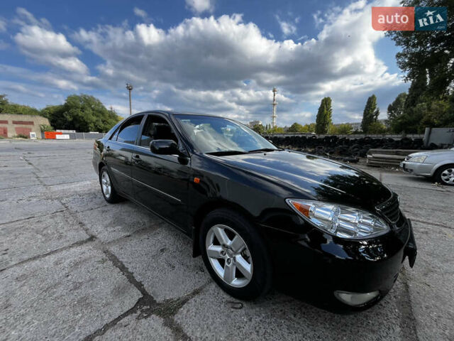 Черный Тойота Камри, объемом двигателя 3 л и пробегом 320 тыс. км за 5100 $, фото 6 на Automoto.ua