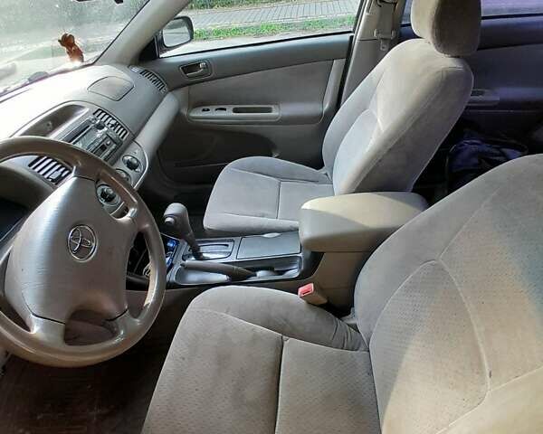 Чорний Тойота Камрі, об'ємом двигуна 3 л та пробігом 400 тис. км за 4000 $, фото 6 на Automoto.ua