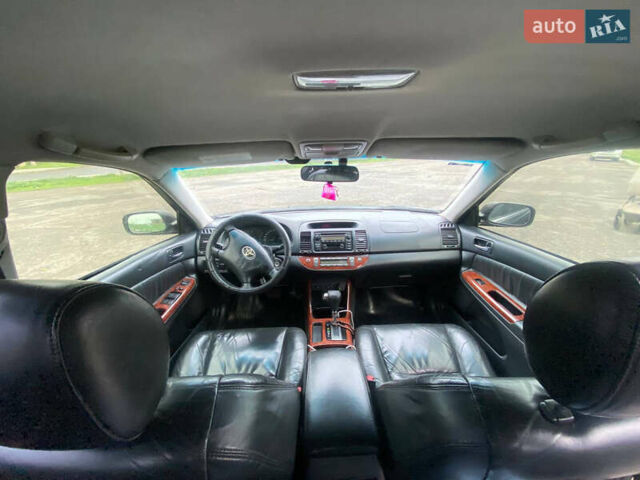 Черный Тойота Камри, объемом двигателя 3 л и пробегом 325 тыс. км за 6000 $, фото 7 на Automoto.ua