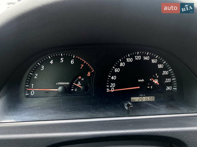 Чорний Тойота Камрі, об'ємом двигуна 2.4 л та пробігом 201 тис. км за 6999 $, фото 25 на Automoto.ua
