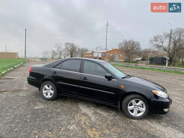 Черный Тойота Камри, объемом двигателя 3 л и пробегом 325 тыс. км за 6000 $, фото 2 на Automoto.ua