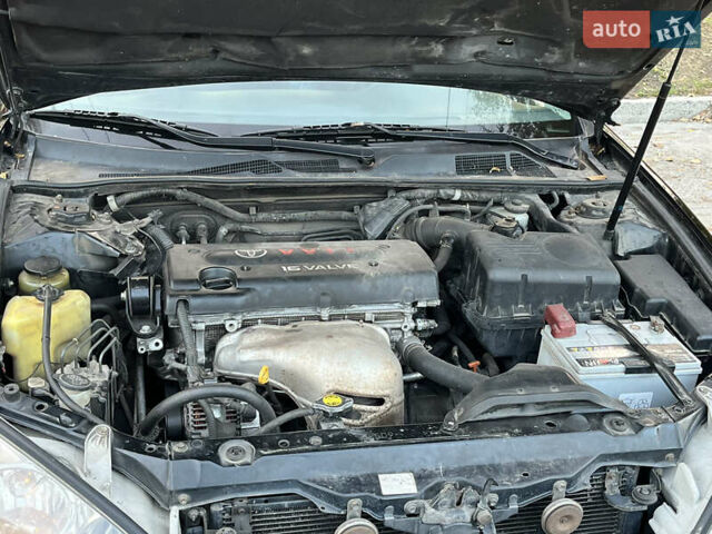 Черный Тойота Камри, объемом двигателя 2.4 л и пробегом 325 тыс. км за 4500 $, фото 11 на Automoto.ua