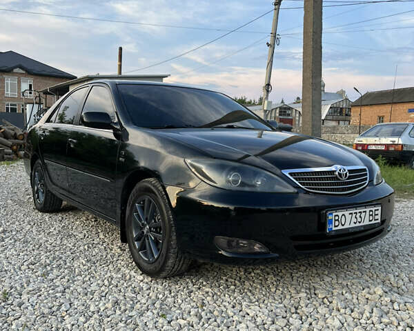 Чорний Тойота Камрі, об'ємом двигуна 2.36 л та пробігом 511 тис. км за 7600 $, фото 18 на Automoto.ua