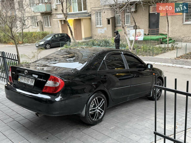 Черный Тойота Камри, объемом двигателя 2.36 л и пробегом 353 тыс. км за 6500 $, фото 13 на Automoto.ua